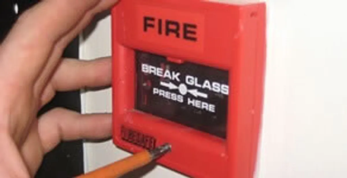 fire alarm installation service showing manual fire alarm pull station installed by licensed electricians in Cherry Hill, NJ