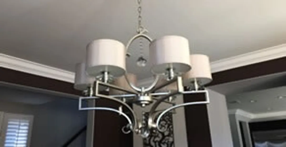 Modern chandelier installation with multiple light fixtures in Cherry Hill, NJ